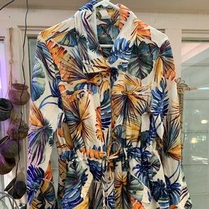 Tunic length floral lightweight jacket. New with tags from Chico’s